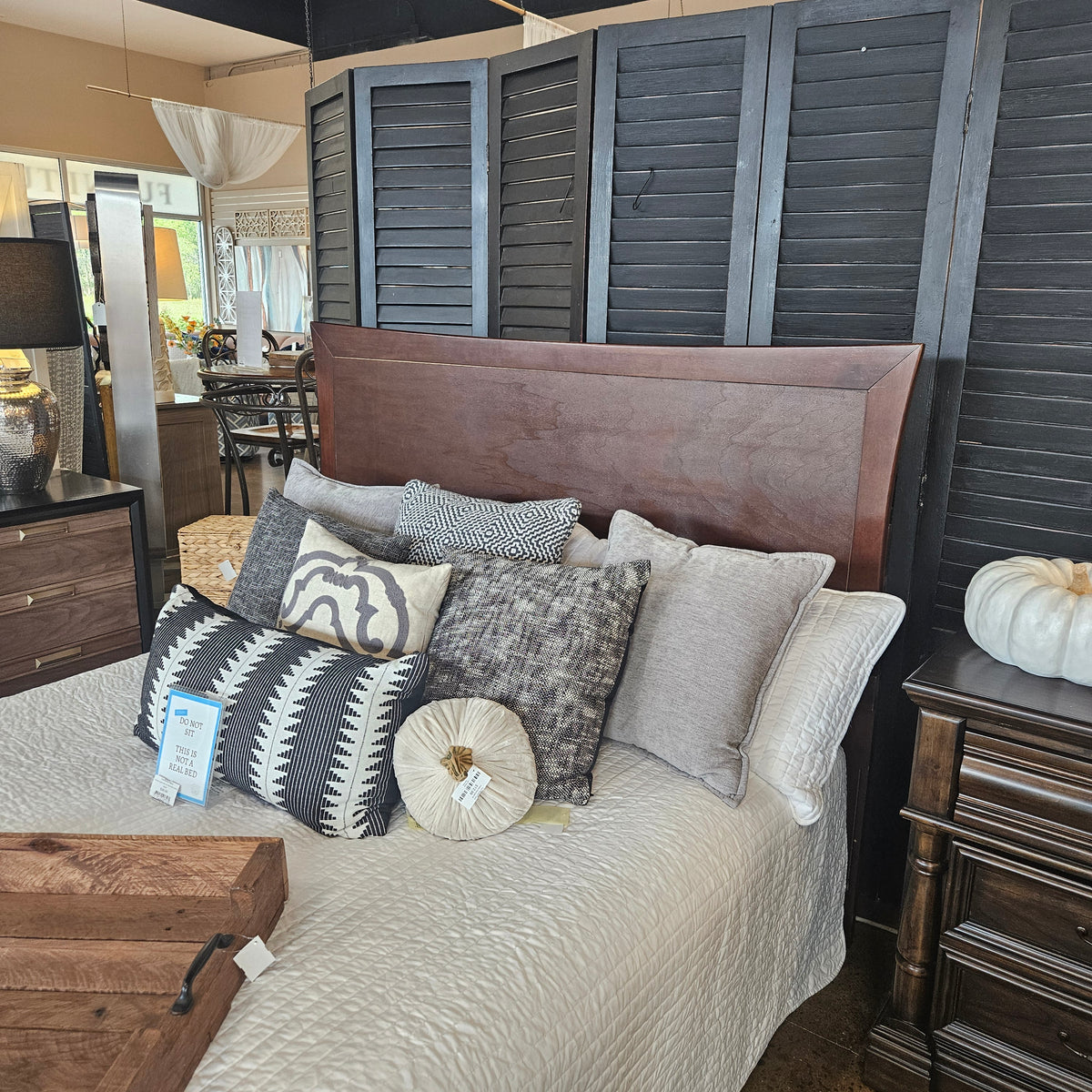 Wooden queen bed with flared side headboard
