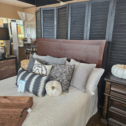 Wooden queen bed with flared side headboard