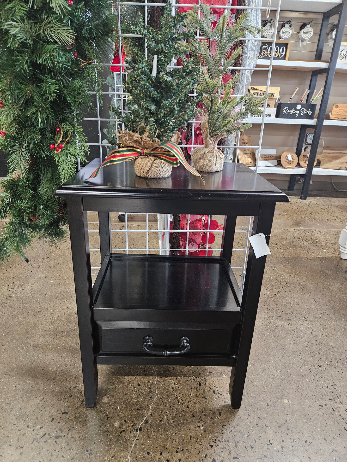 Pier 1 black end table with lower drawer