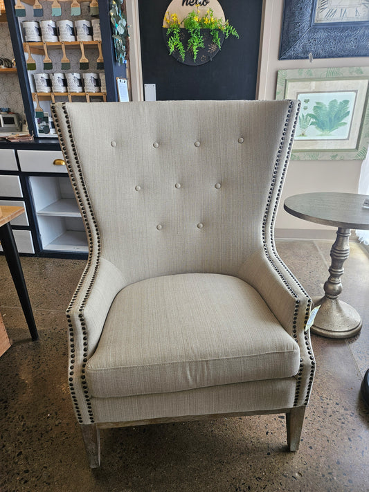 Neutral Nail Trimmed Accent Chair