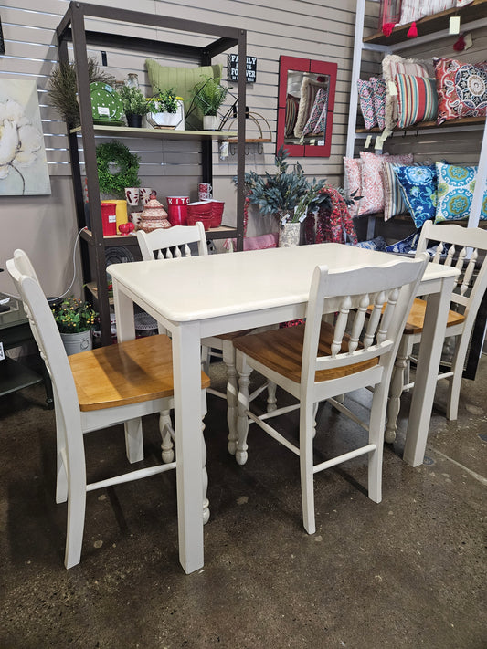White high-top kitchen table and chairs