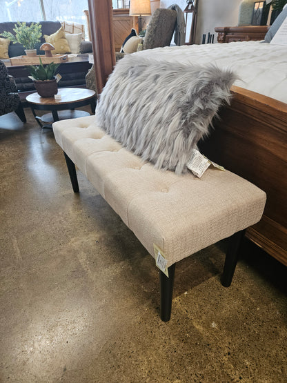 Neutral upholstered tufted bench