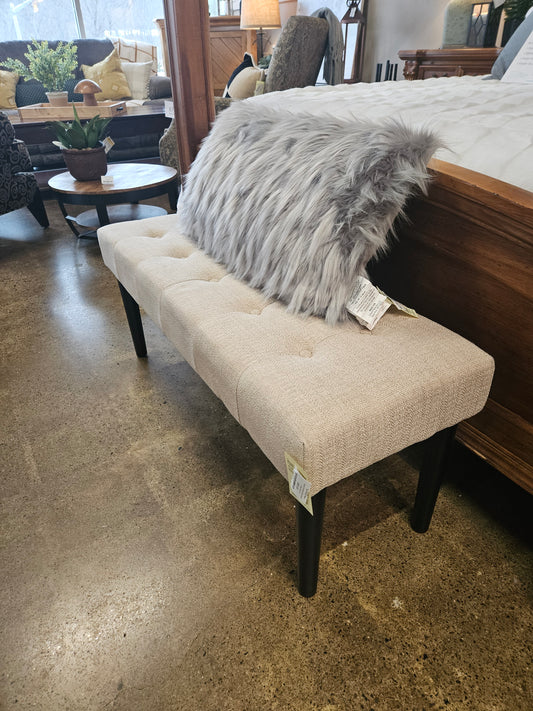 Neutral upholstered tufted bench