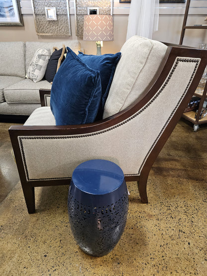 Cream fabric with distressed wood chair