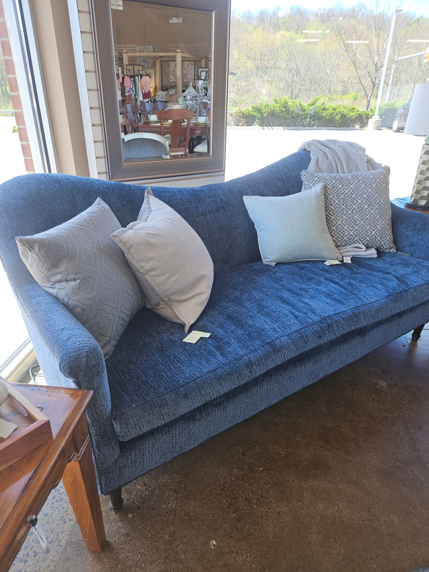 Blue curved top sofa