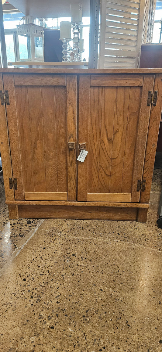 Light wood storage cabinet