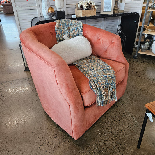 Burnt orange swivel chair (NEW from Model Home)