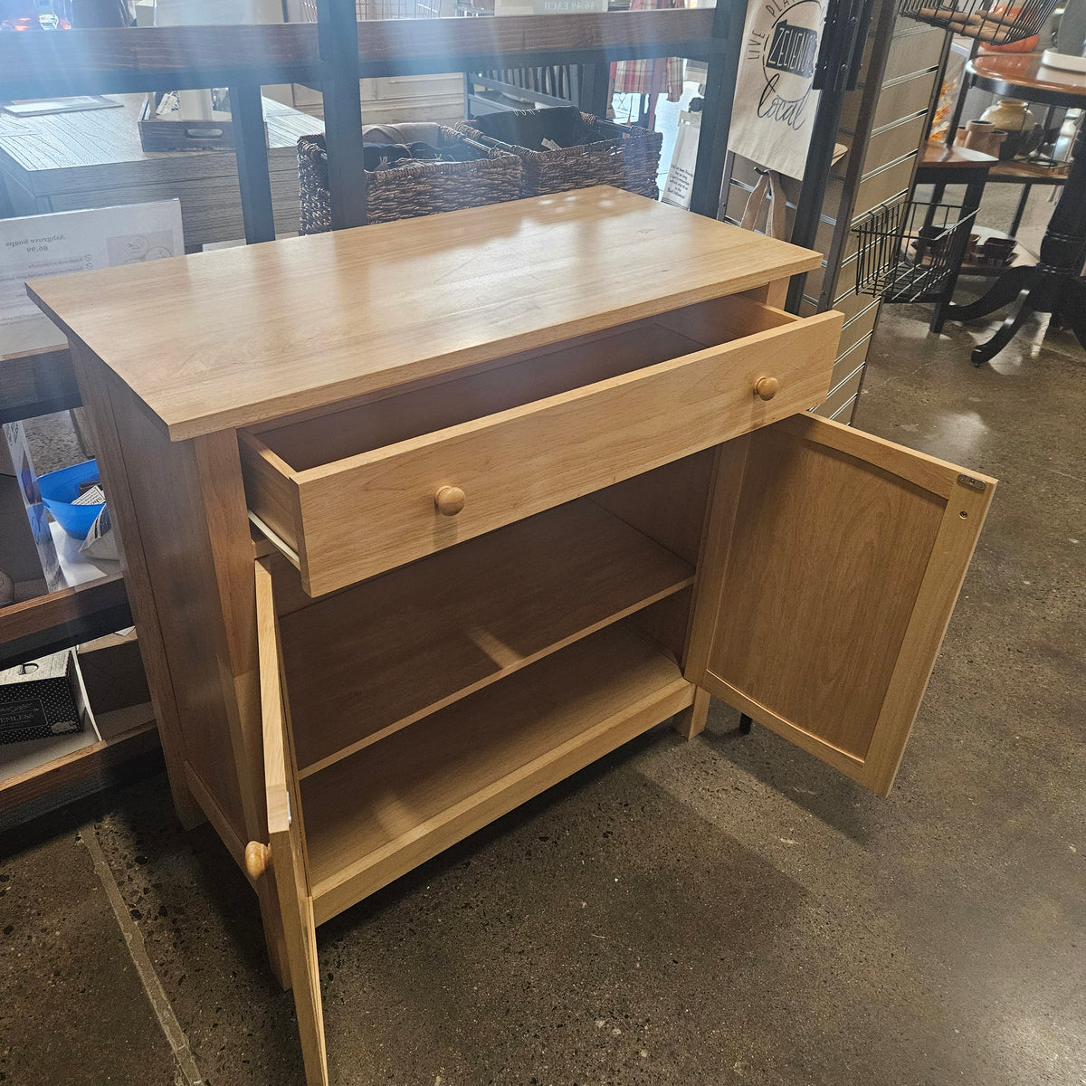 Light wood storage cabinet with single top drawer