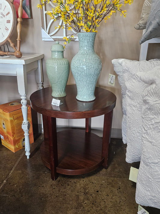 Dark round end table