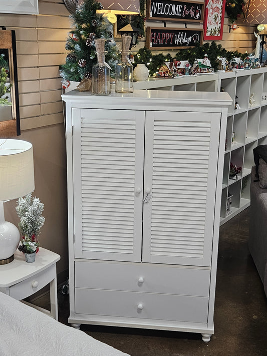 White cabinet with drawers and shelves