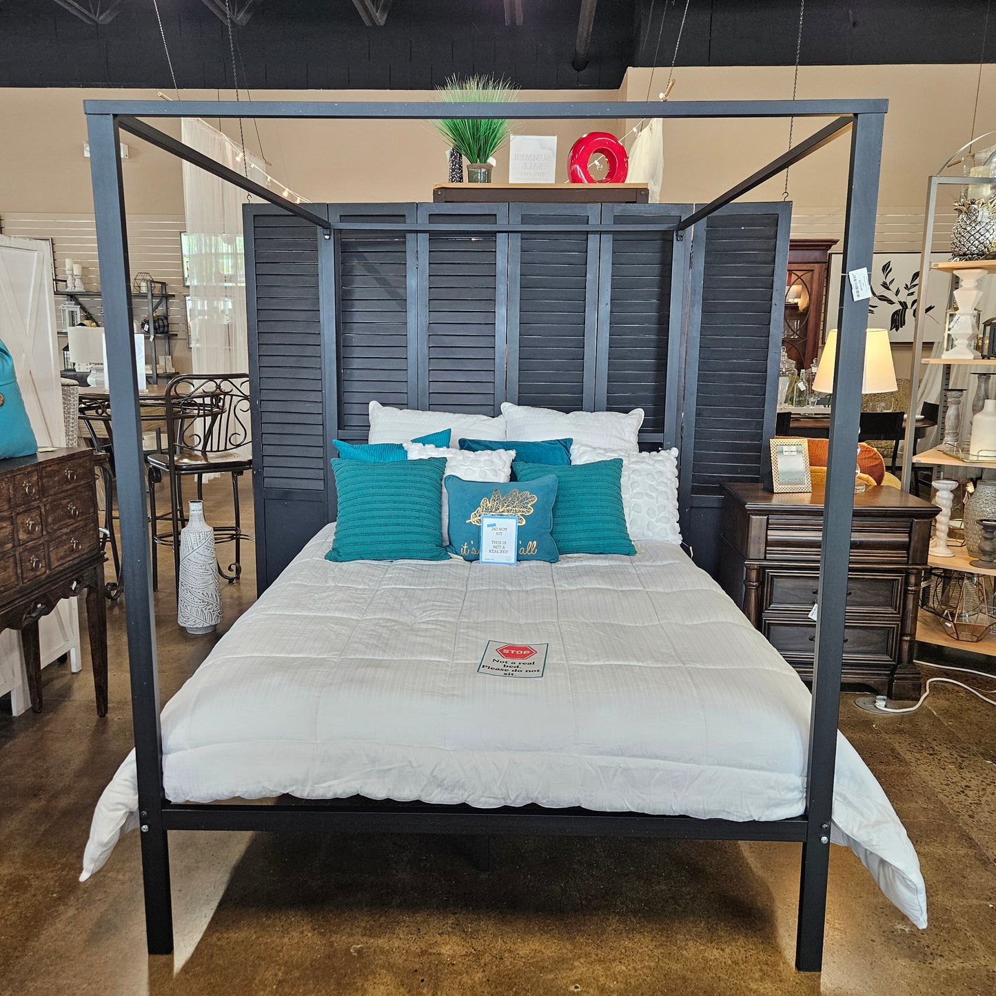 Black queen canopy bed