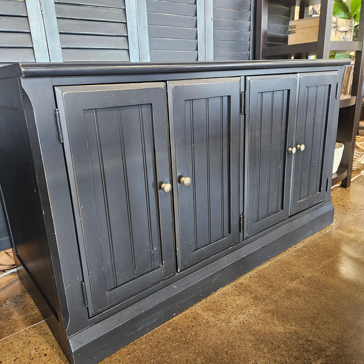 Black distressed entertainment center