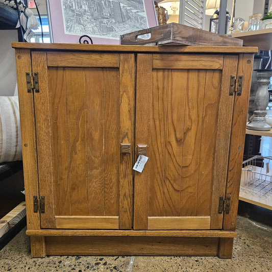 Light wood storage cabinet