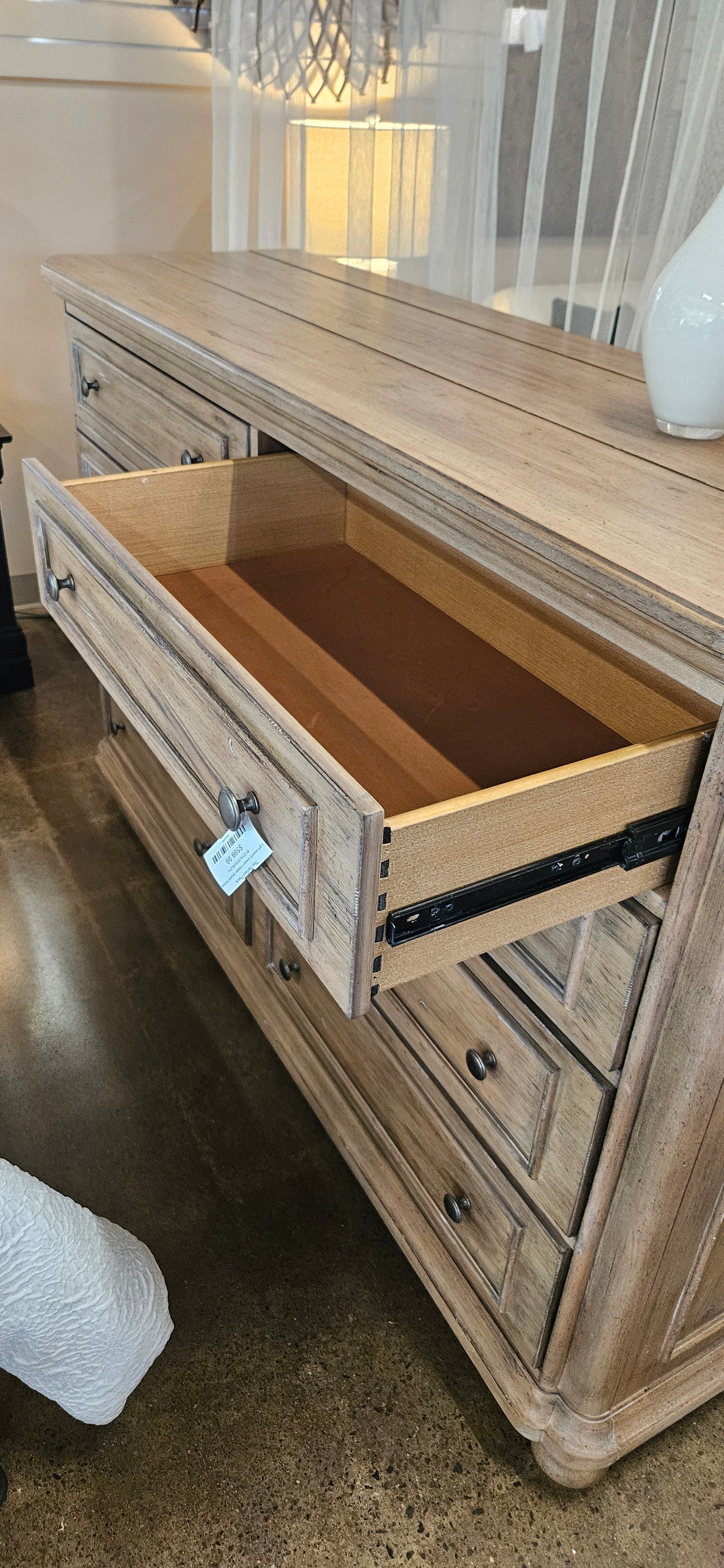 Light wood 8 drawer dresser (Model Home)
