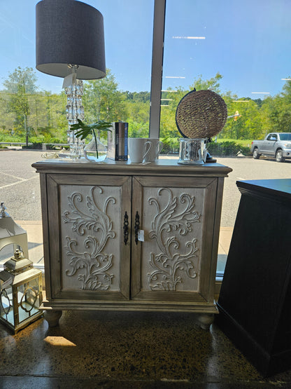Wood carved accent cabinet
