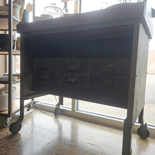 Metal table with drawers and wheels