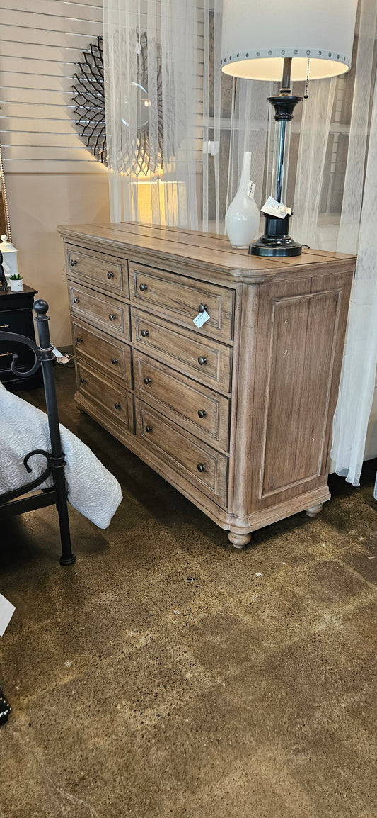 Light wood 8 drawer dresser (Model Home)