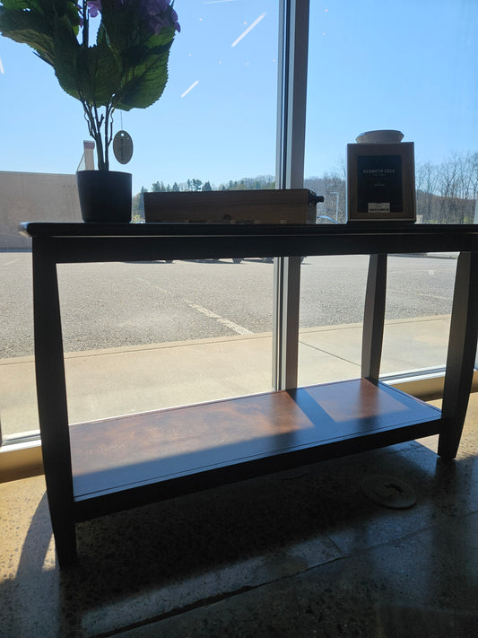 Dark sofa table with bottom shelf