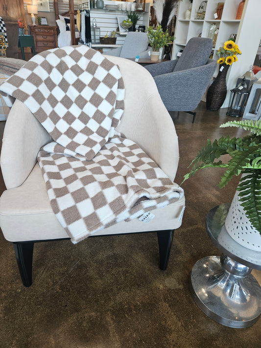 Curved beige accent chair with contoured wood veneer back